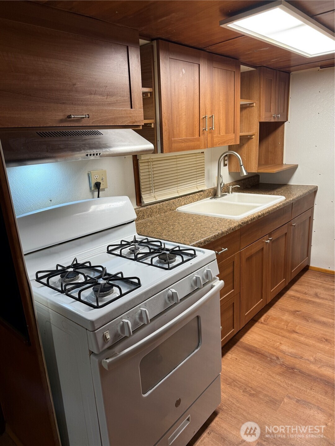 334 Devoe Street Northeast Olympia, WA 98506 - Photo 20 of 29 a white stove top oven sitting inside of a kitchen