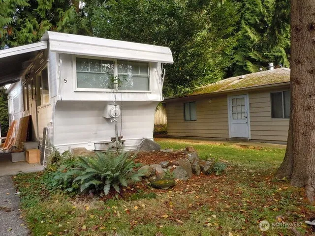 a kitchen that has a sink and a stove