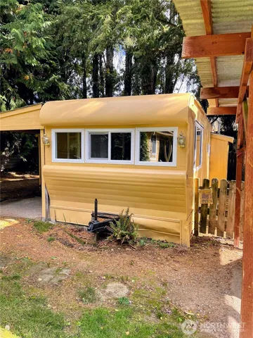 a kitchen with a stove and a microwave