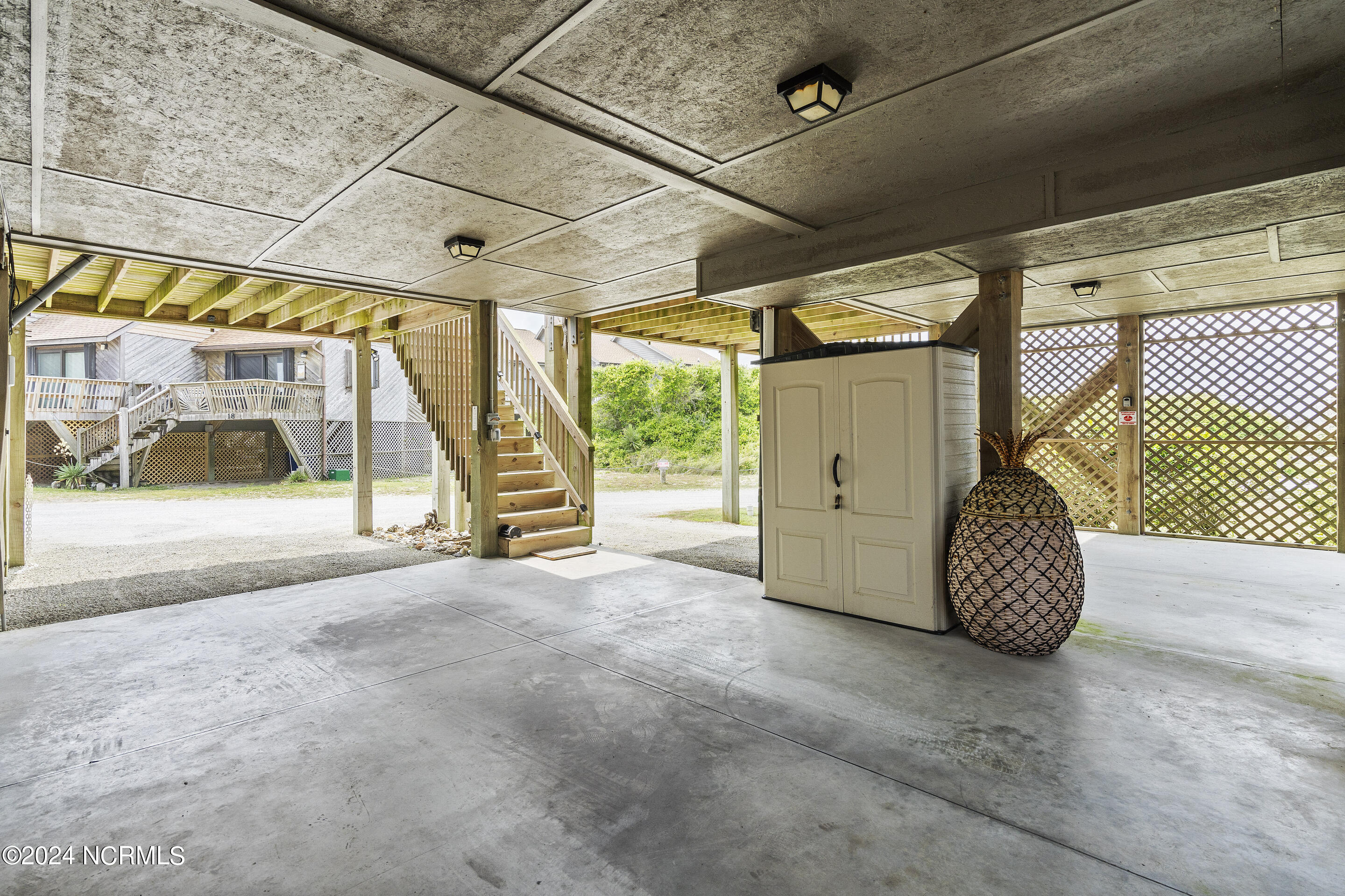892 New River Inlet Road, Unit 9 North Topsail Beach, NC 28460 - Photo 52 of 74 Parking Underneath