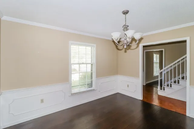 a view of empty room with a fireplace