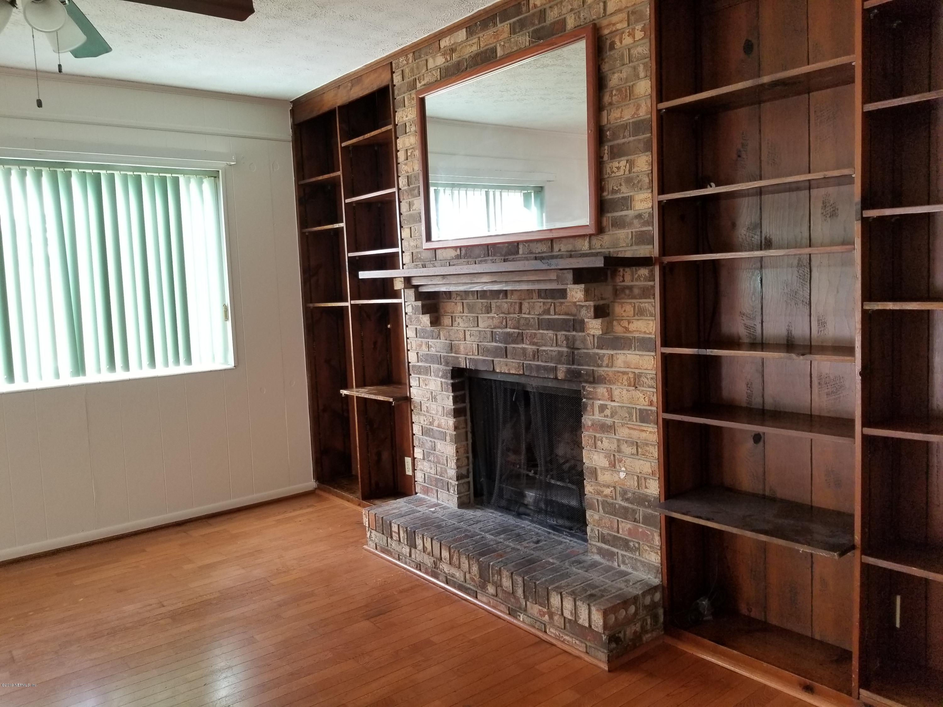 2434 Evernia Road Jacksonville, FL 32211 - Photo 13 of 29 Family Rm bookshelves
