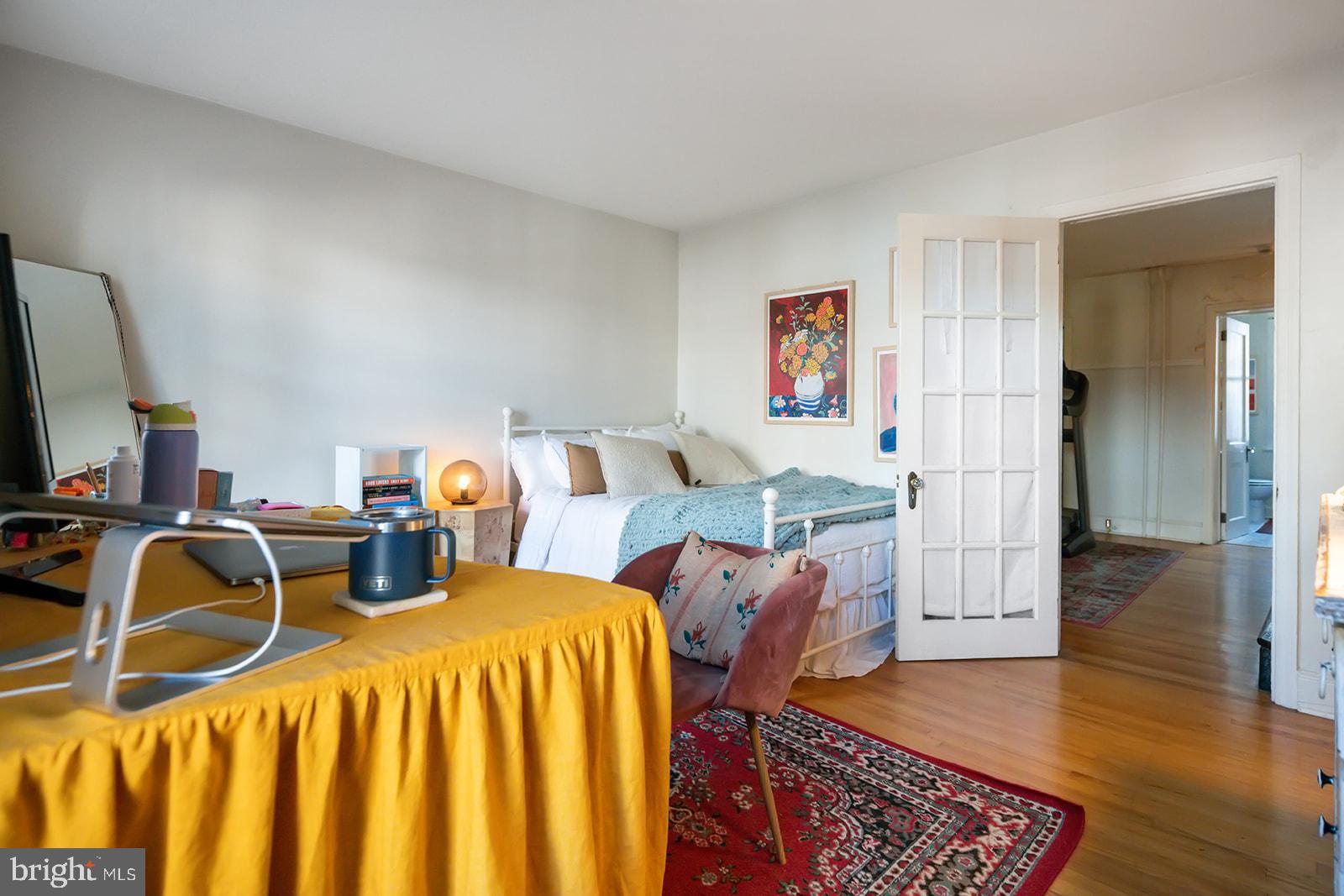 516 Kauffman Street Philadelphia, PA 19147 - Photo 17 of 37 a bed room with two beds and a television