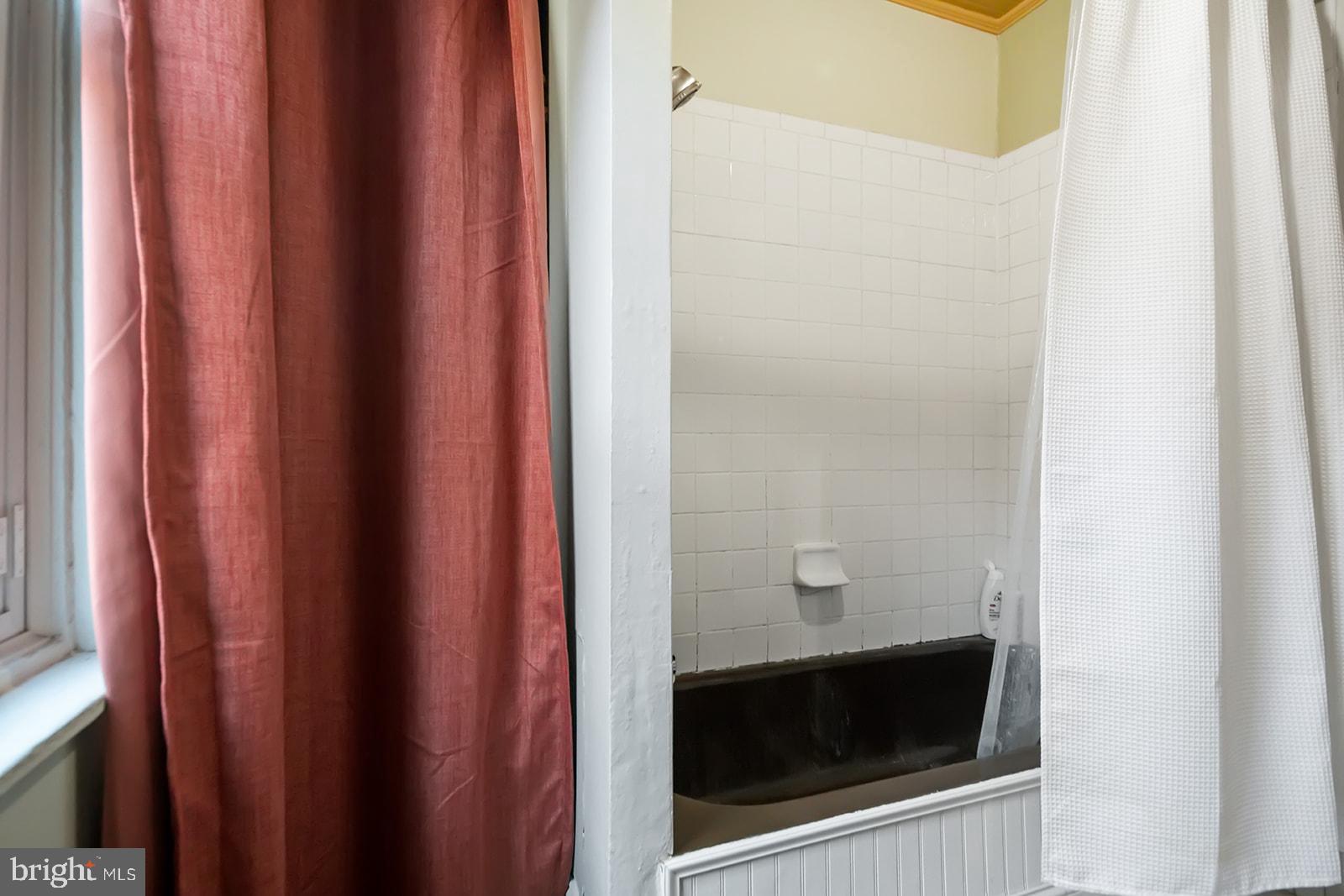 516 Kauffman Street Philadelphia, PA 19147 - Photo 19 of 37 a bathroom with a sink and a mirror