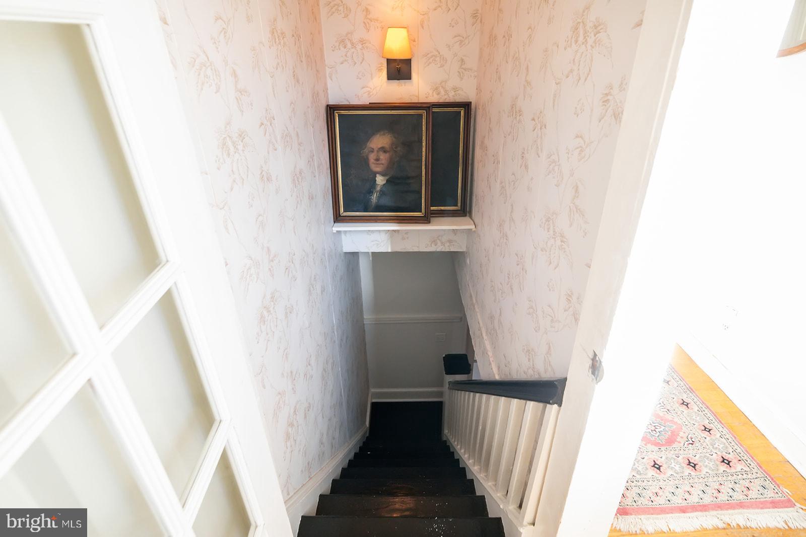 516 Kauffman Street Philadelphia, PA 19147 - Photo 21 of 37 a view of a hallway with wooden floor and staircase