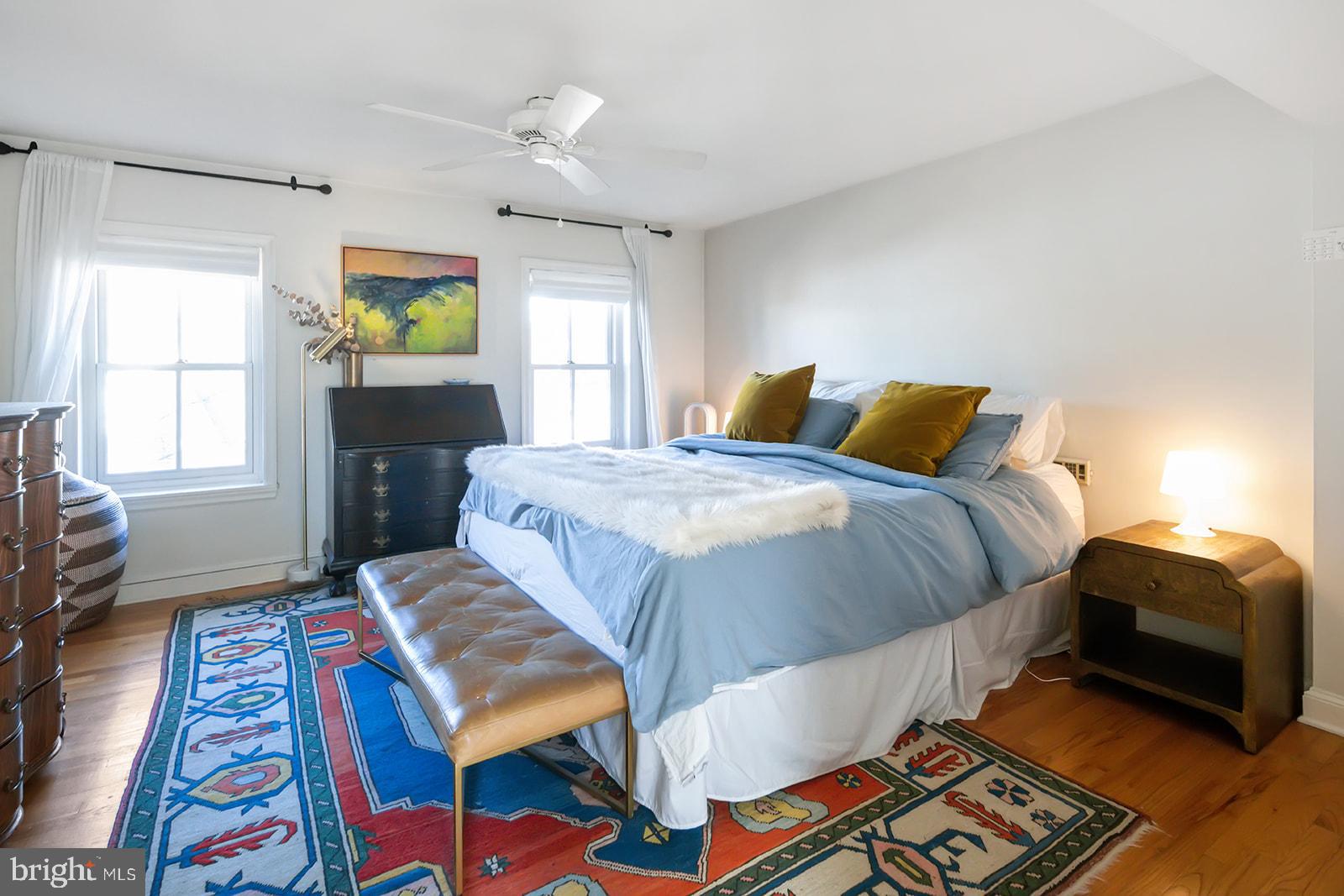 516 Kauffman Street Philadelphia, PA 19147 - Photo 25 of 37 a bedroom with a bed and wooden floor