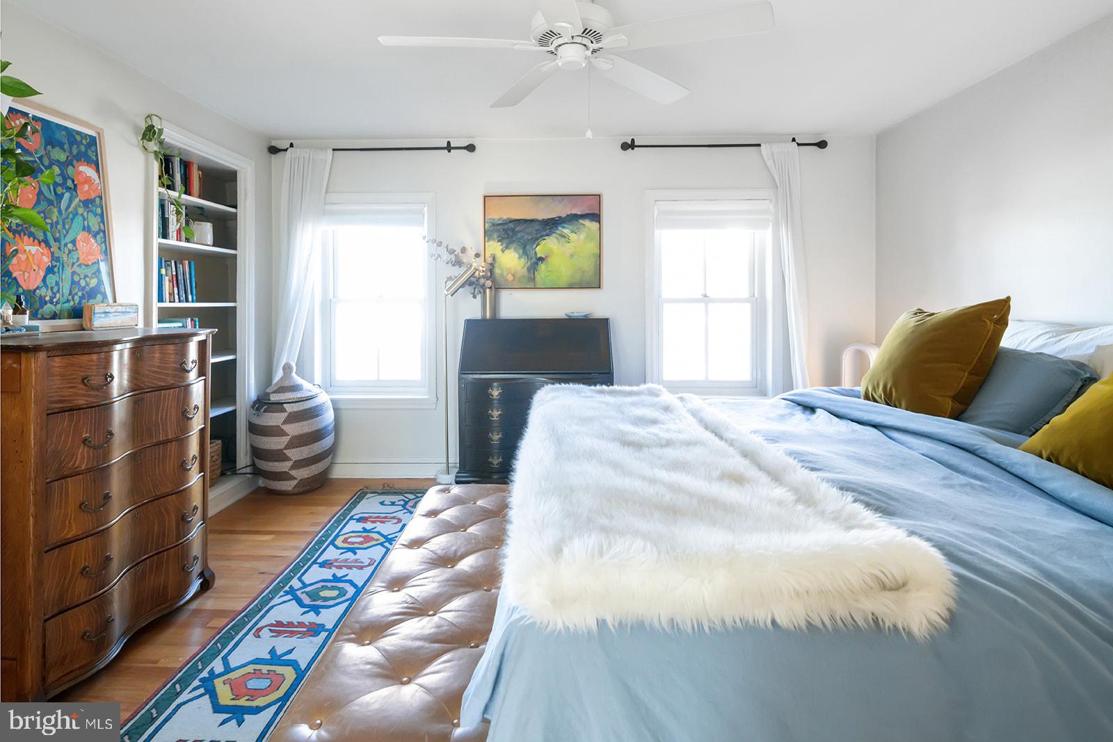 516 Kauffman Street Philadelphia, PA 19147 - Photo 26 of 37 a bedroom with a bed and wooden floor