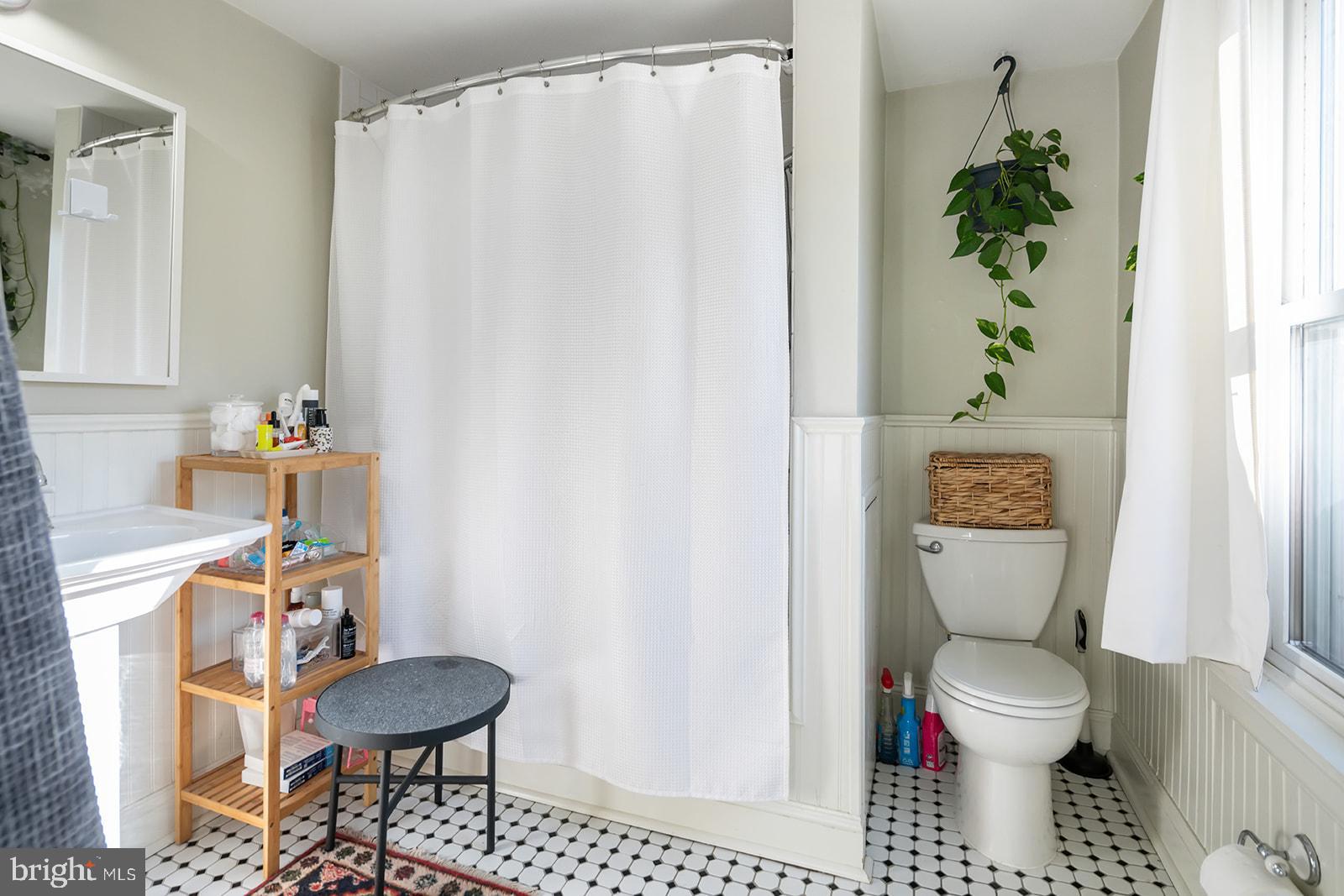 516 Kauffman Street Philadelphia, PA 19147 - Photo 30 of 37 a bathroom with a toilet and a sink
