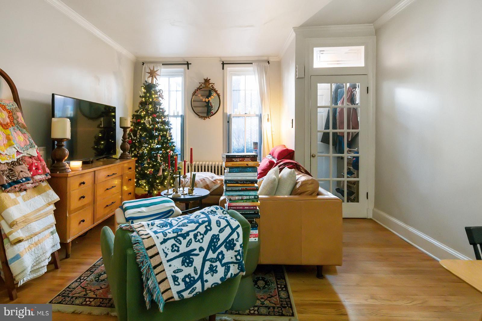 516 Kauffman Street Philadelphia, PA 19147 - Photo 4 of 37 a living room with furniture and a flat screen tv