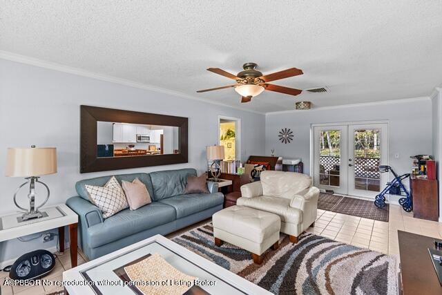 14 Bamboo Lane Jupiter, FL 33458 - Photo 19 of 33 a living room with furniture a couch and wooden floor