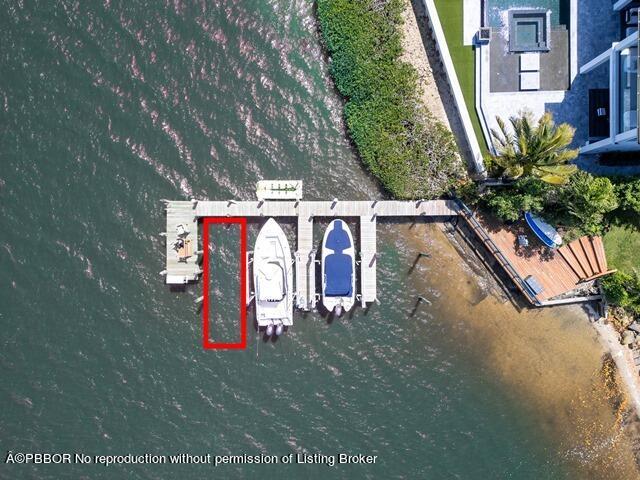 14 Bamboo Lane Jupiter, FL 33458 - Photo 32 of 33 an outdoor space with seating