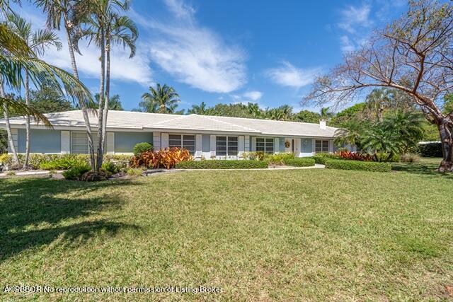14 Bamboo Lane Jupiter, FL 33458 - Photo 8 of 33 a view of a house with a yard