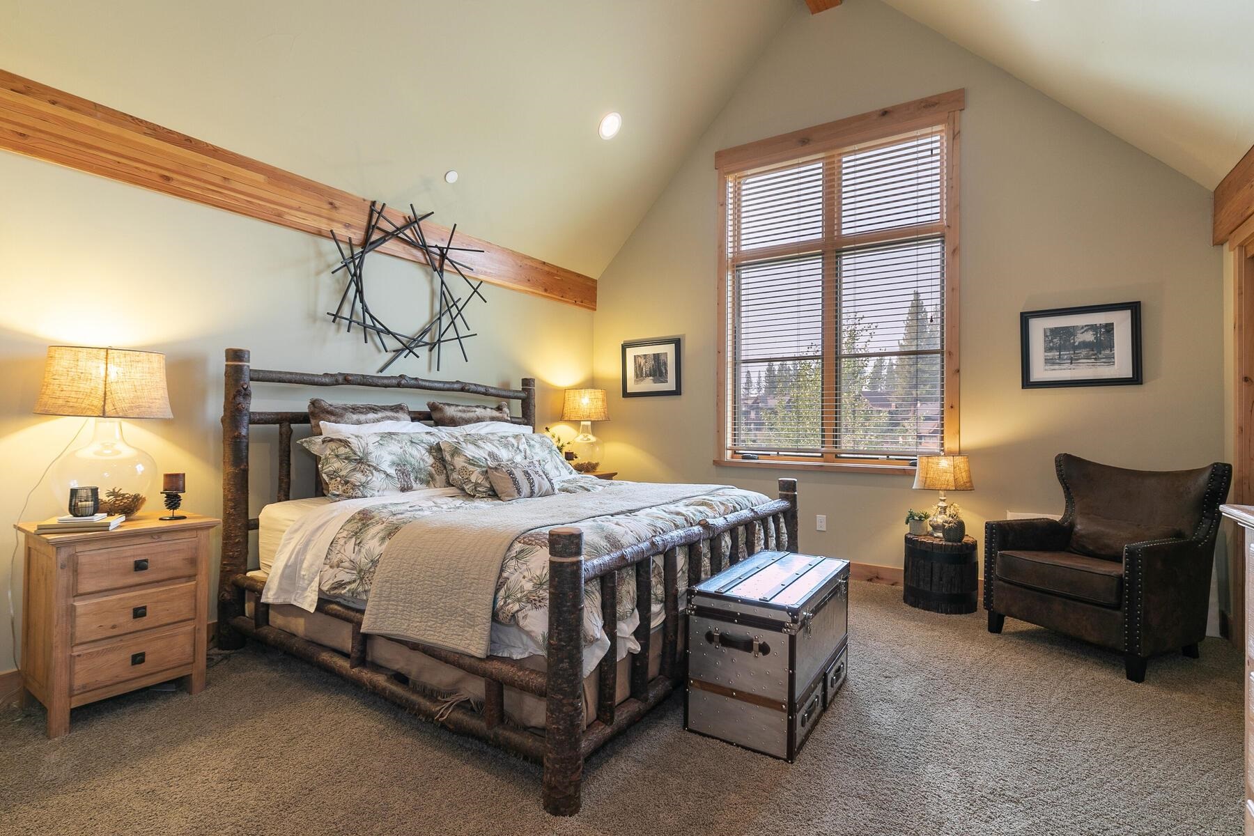 10100 Sagebrush Court, Unit 65 Truckee, CA 96161 - Photo 12 of 21 a bedroom with a bed a couch and dresser