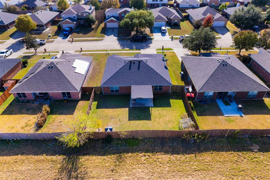 114 Rio Grande Drive Crandall, TX 75114 - Photo 33 of 34 a view of an swimming pool with a yard