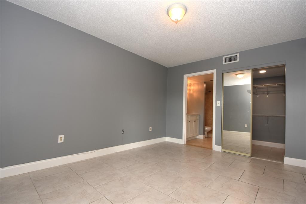 231 Southwest 113th Way, Unit 231 Pembroke Pines, FL 33025 - Photo 15 of 39 a view of an empty room