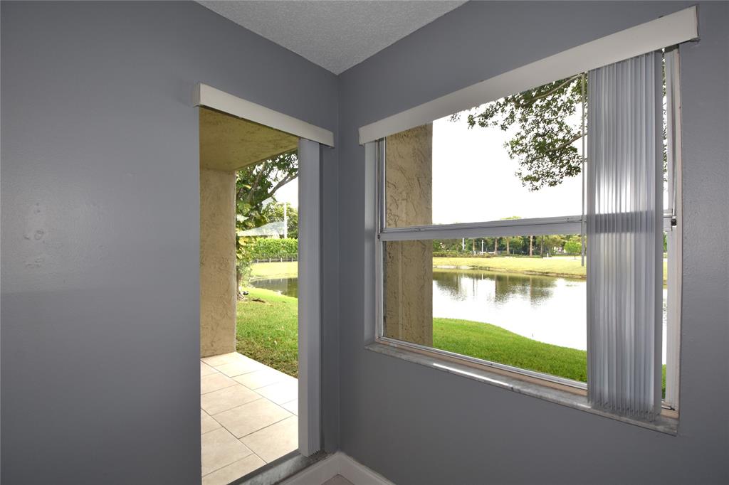 231 Southwest 113th Way, Unit 231 Pembroke Pines, FL 33025 - Photo 16 of 39 a window with an outdoor space