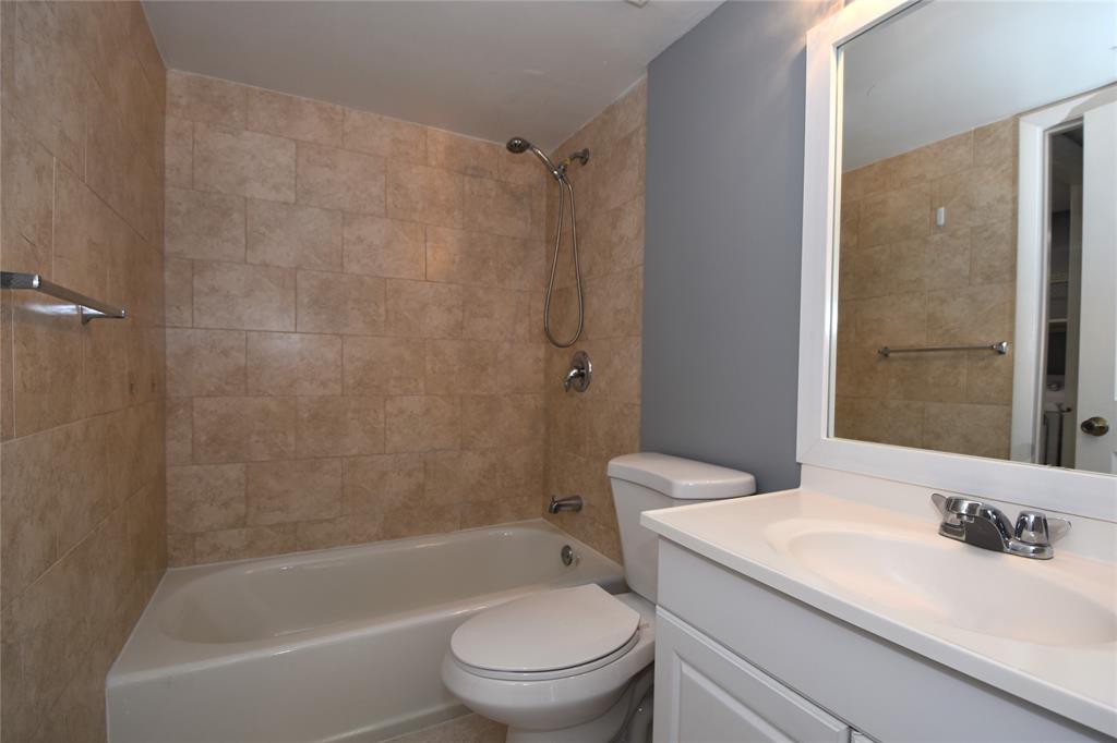 231 Southwest 113th Way, Unit 231 Pembroke Pines, FL 33025 - Photo 23 of 39 a bathroom with a sink toilet and shower