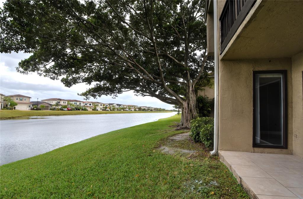 231 Southwest 113th Way, Unit 231 Pembroke Pines, FL 33025 - Photo 5 of 39 a view of yard with outdoor space