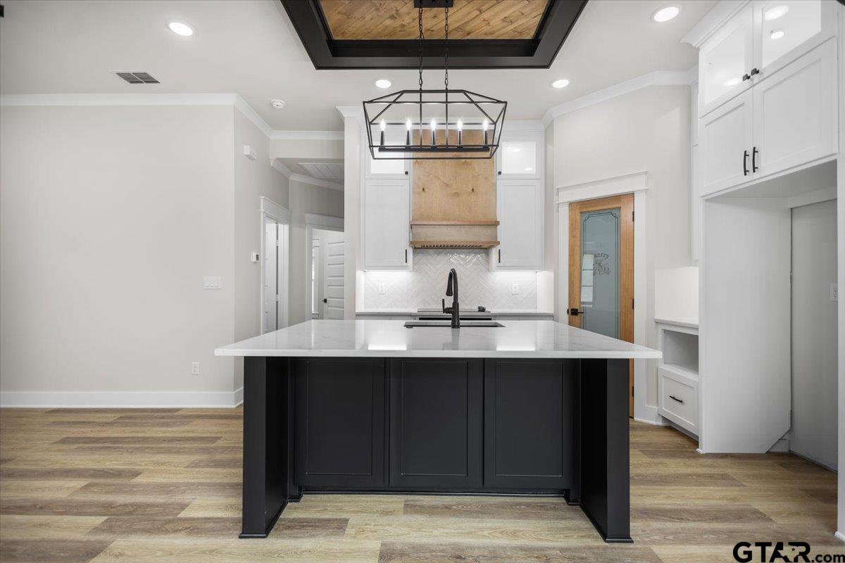 3022 West Rose Street Tyler, TX 75701 - Photo 13 of 46 a bathroom with a sink and a mirror
