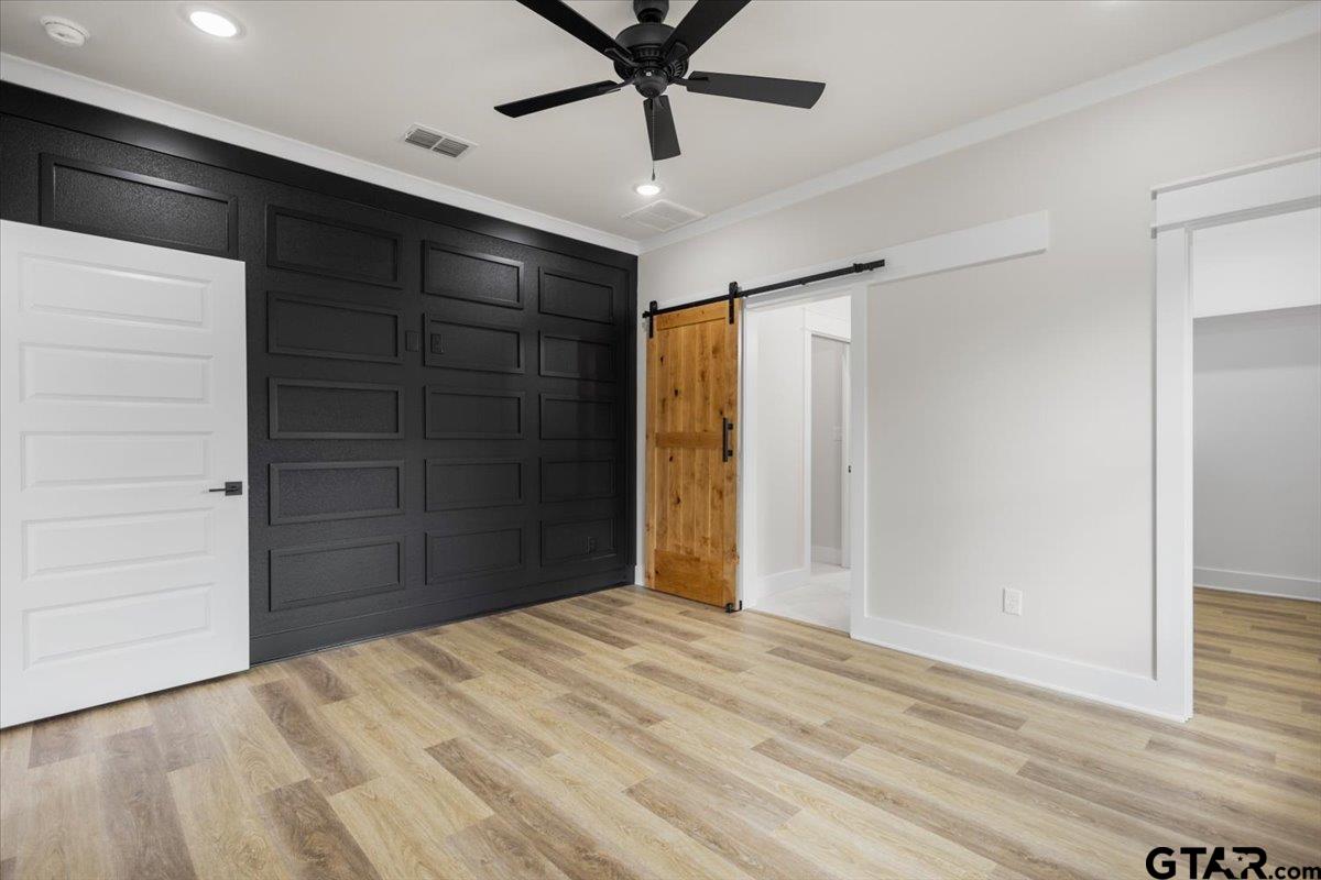 3022 West Rose Street Tyler, TX 75701 - Photo 23 of 46 a view of empty room with cabinet and ceiling fan