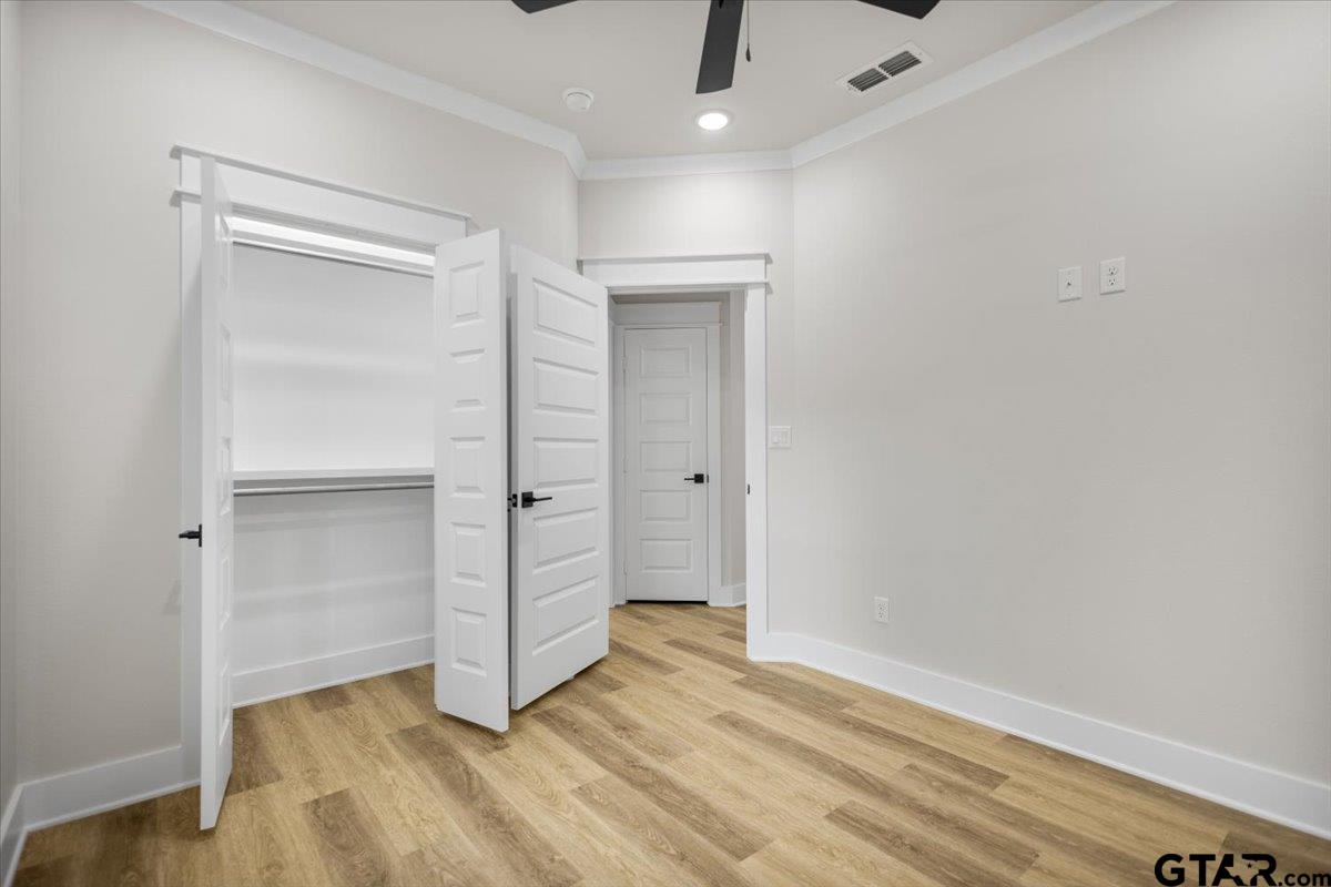 3022 West Rose Street Tyler, TX 75701 - Photo 35 of 46 wooden floor in an empty room