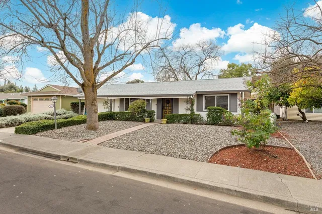 front view of house with a yard