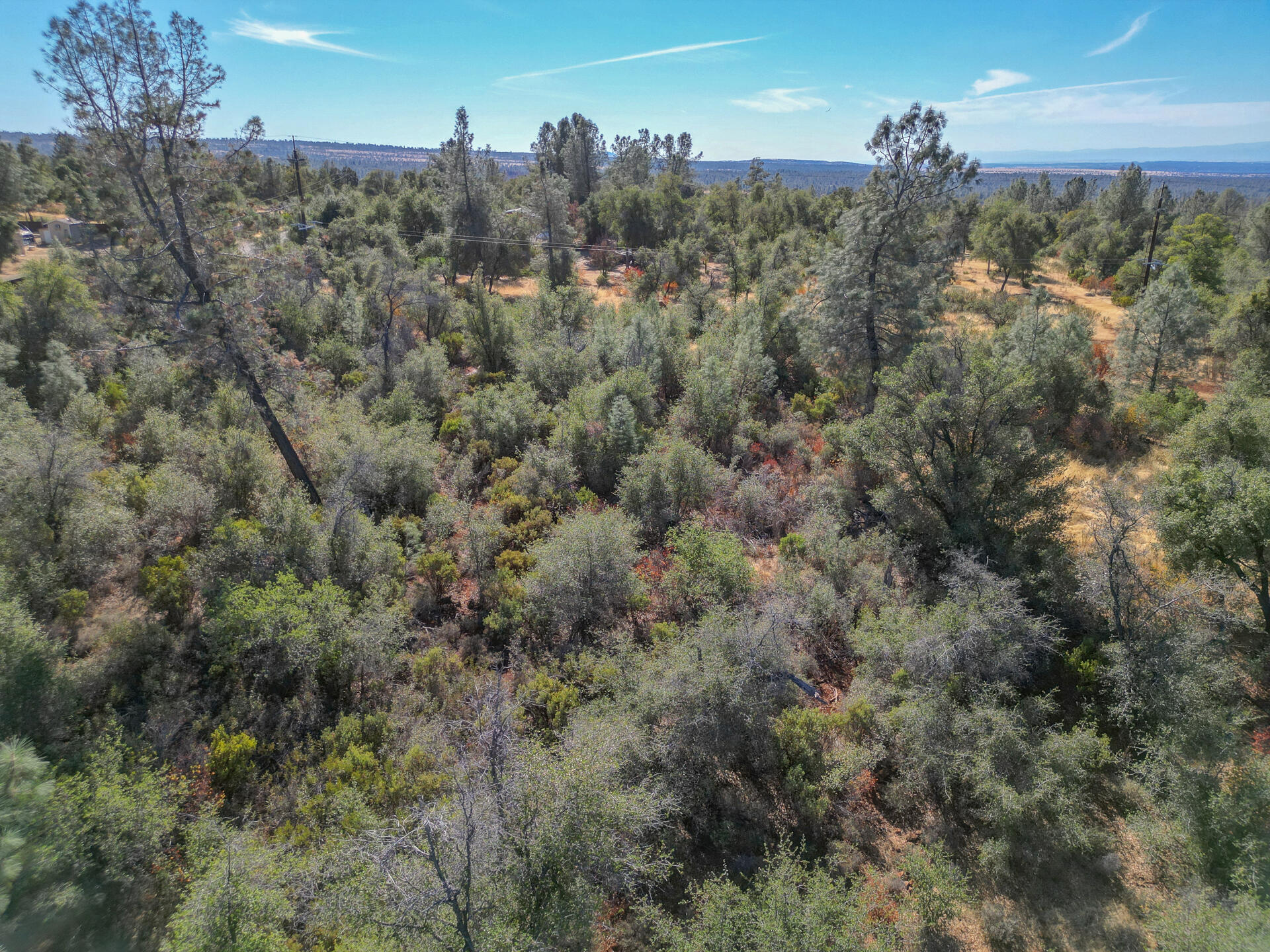 Winoxy 093-130-039-000 Lane Shingletown, CA 96088 - Photo 26 of 29 an aerial view of a house with a yard
