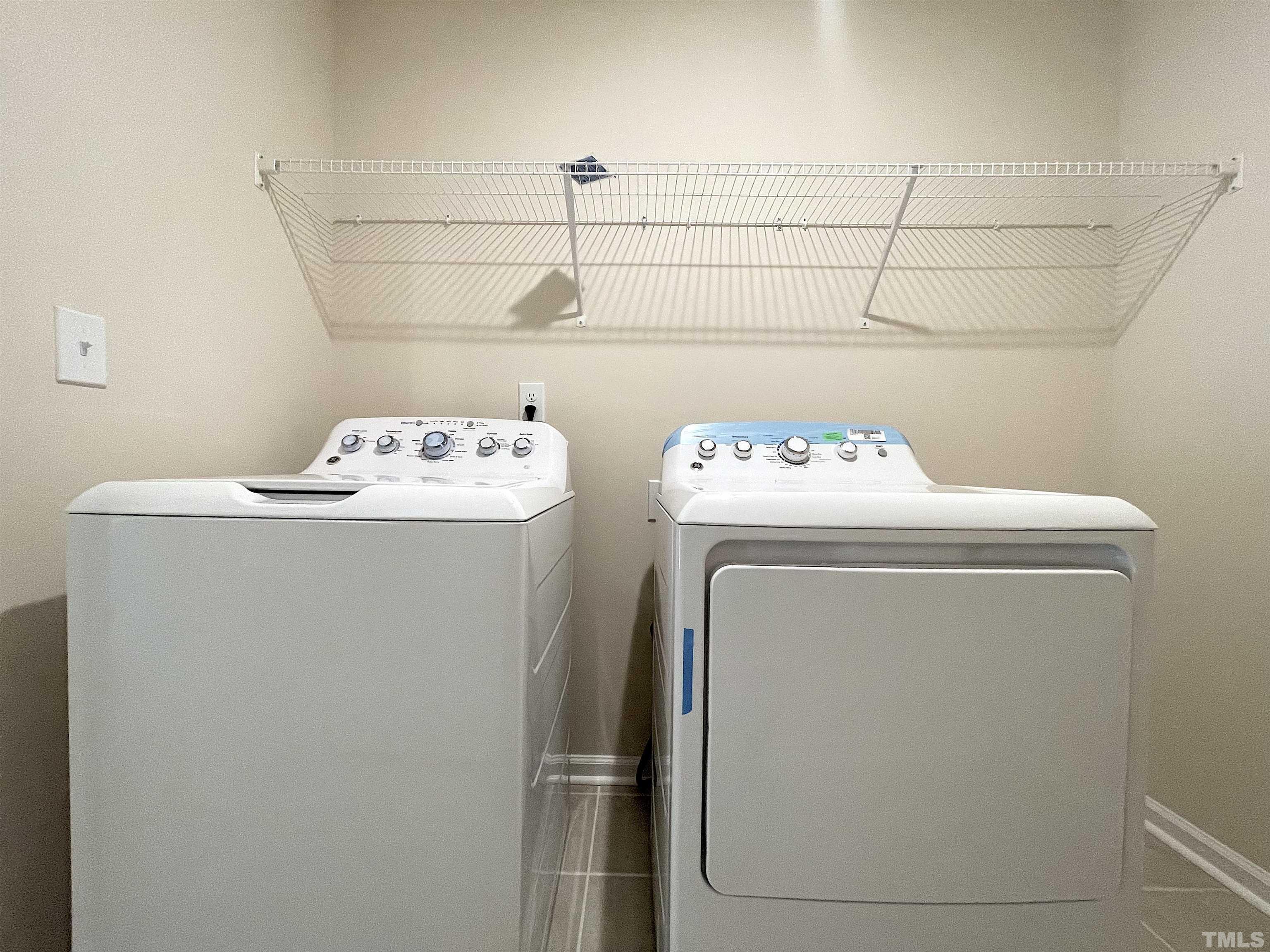 4906 Megara Run Raleigh, NC 27603 - Photo 19 of 30 a utility room with dryer and washer