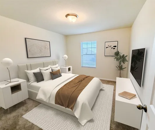 a bedroom with a bed and a couch