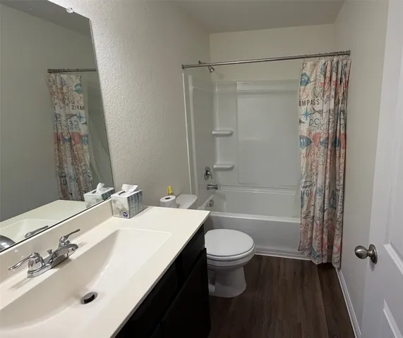 an empty room with a empty space and windows