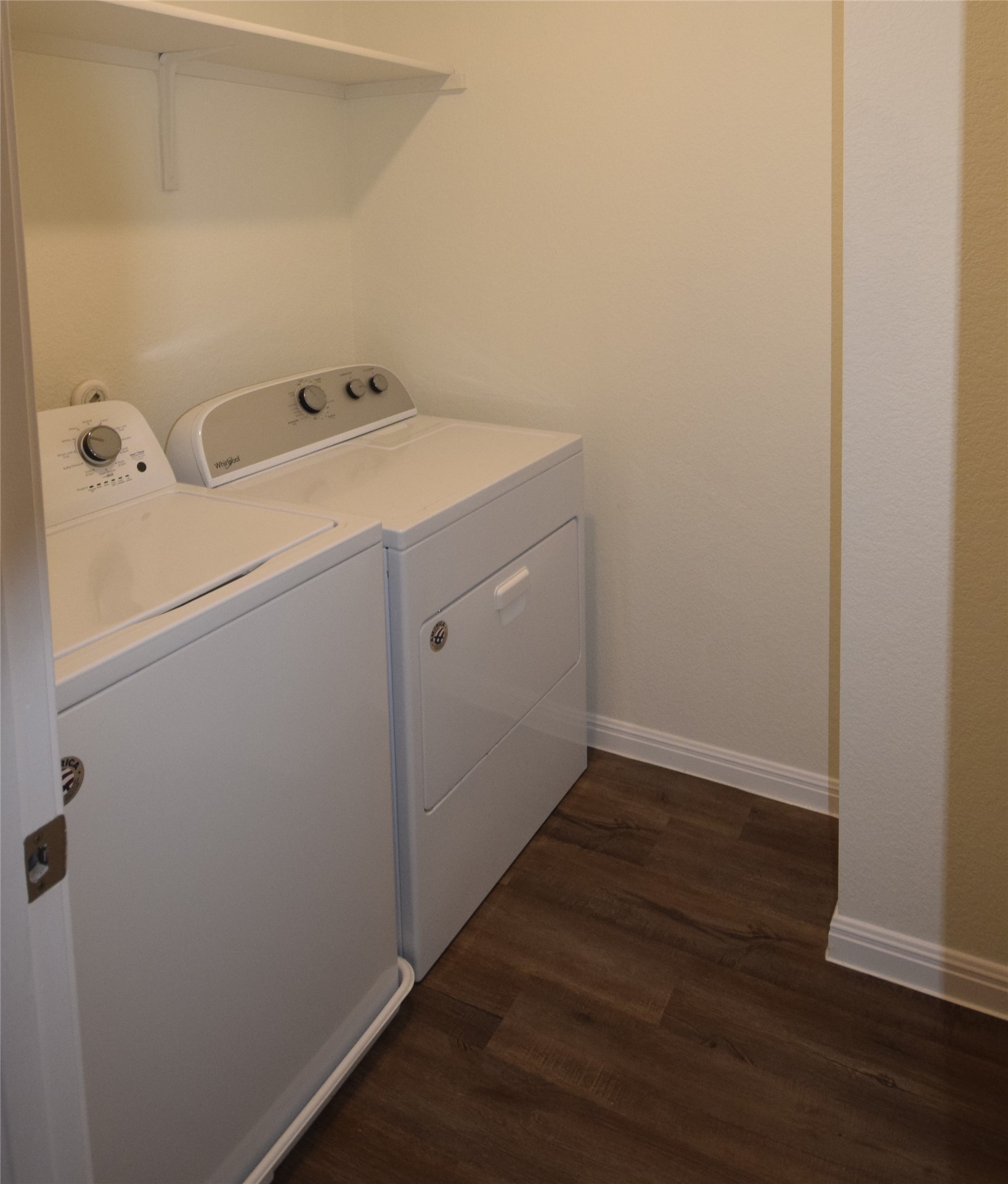 364 Bell Rings Drive Jarrell, TX 76537 - Photo 21 of 25 a utility room with wooden floor washer and dryer