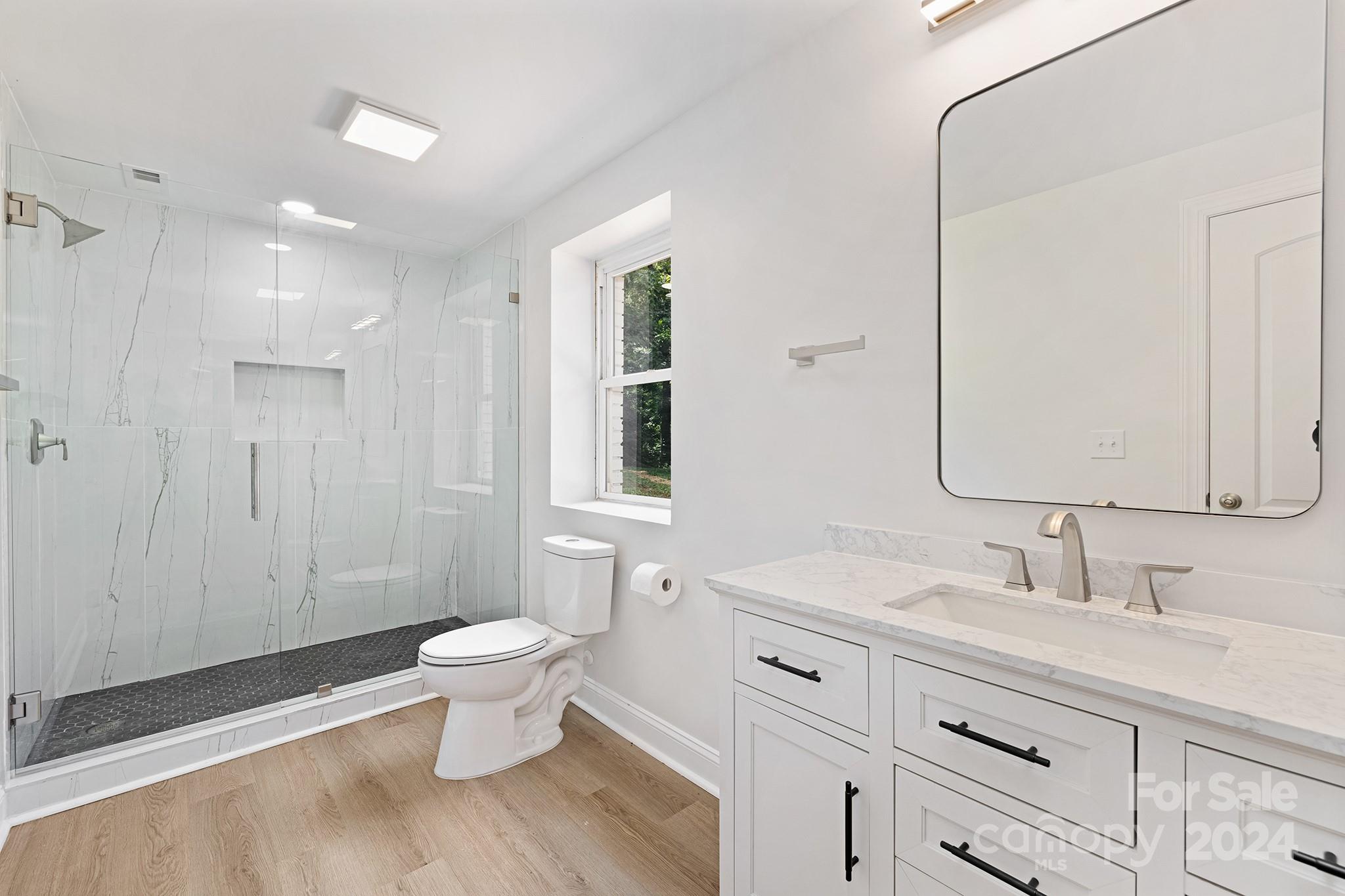 1234 Midway Road Statesville, NC 28625 - Photo 18 of 25 a bathroom with a sink toilet and shower
