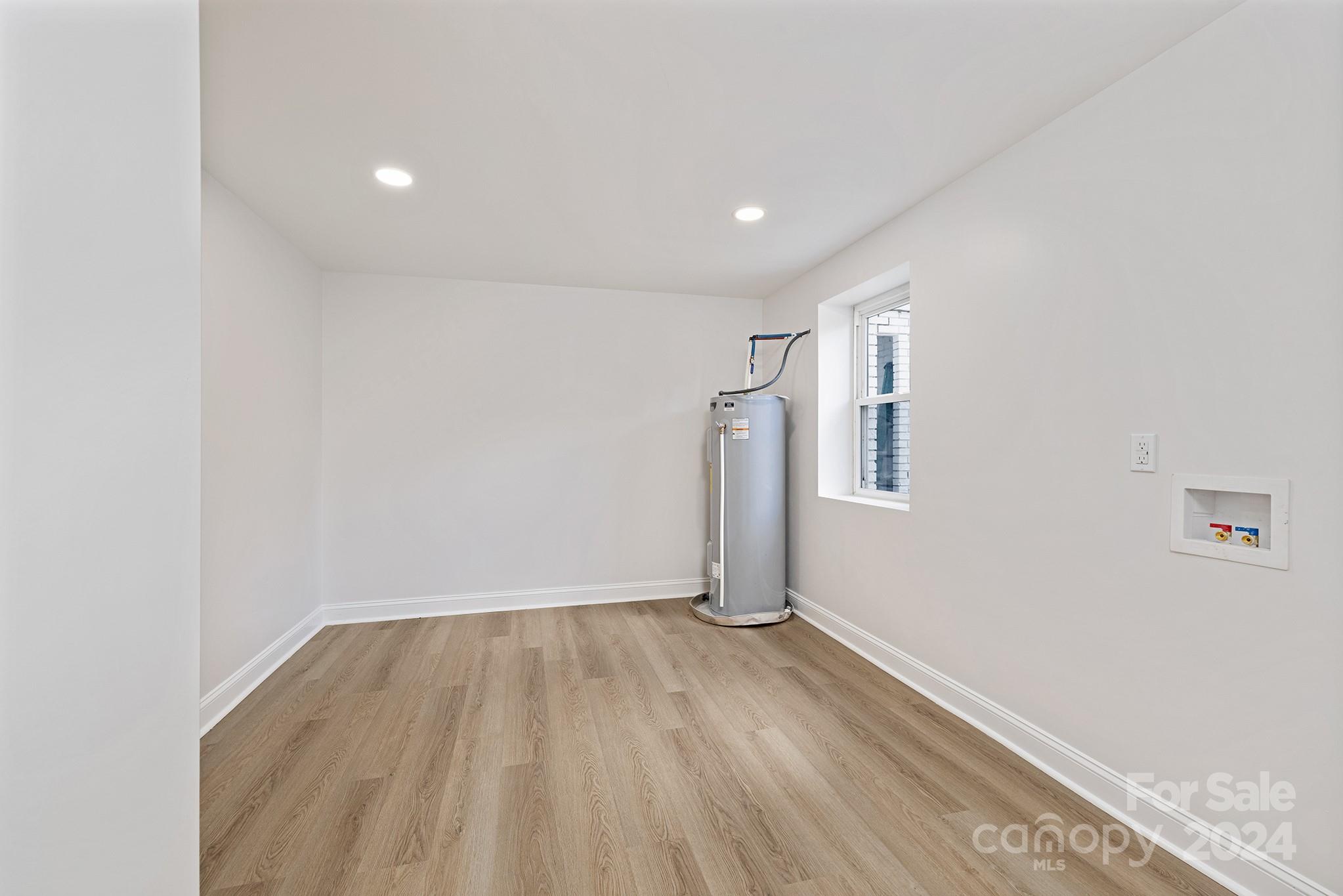 1234 Midway Road Statesville, NC 28625 - Photo 23 of 25 a view of empty room with wooden floor