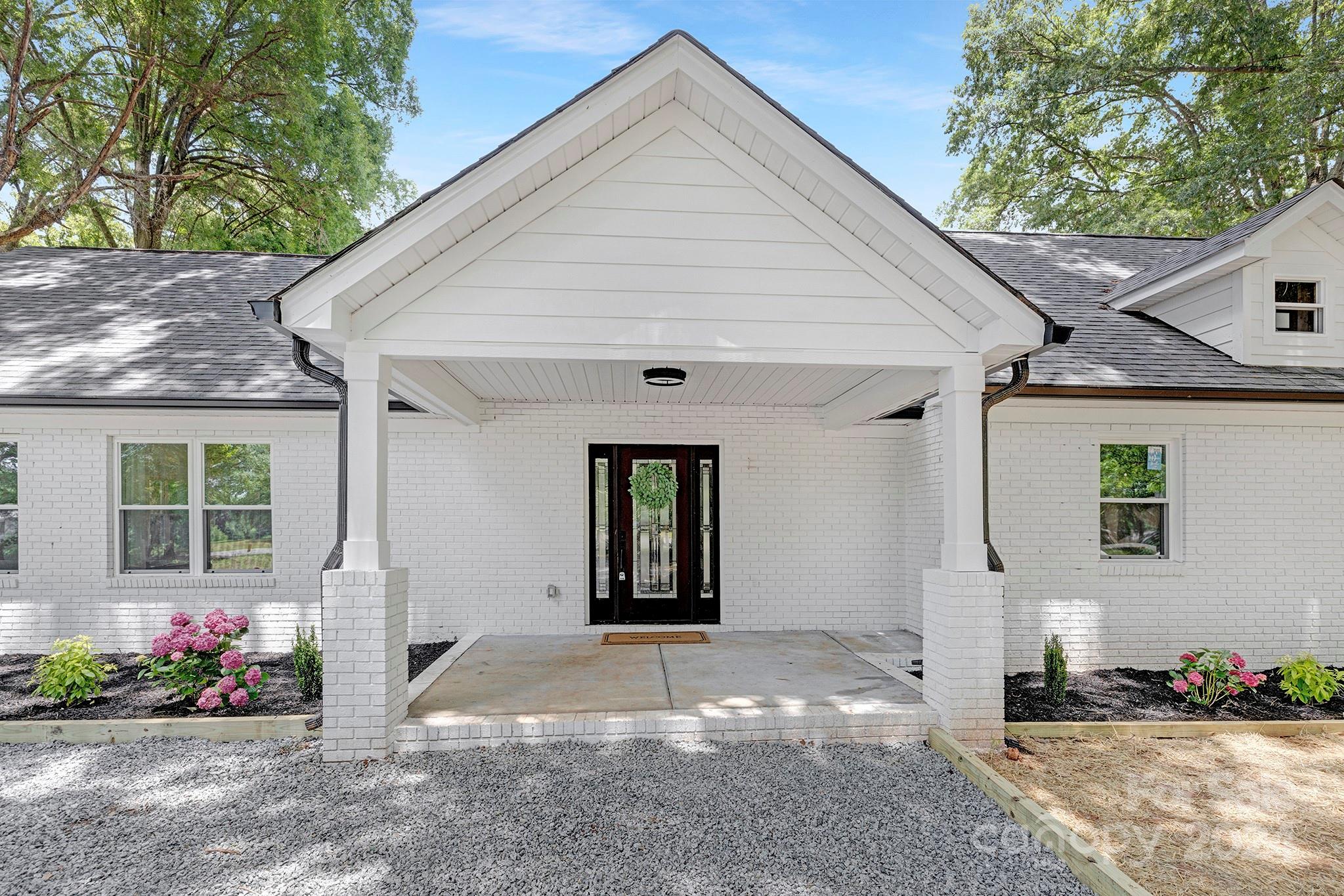 1234 Midway Road Statesville, NC 28625 - Photo 3 of 25 a view of a house with a yard