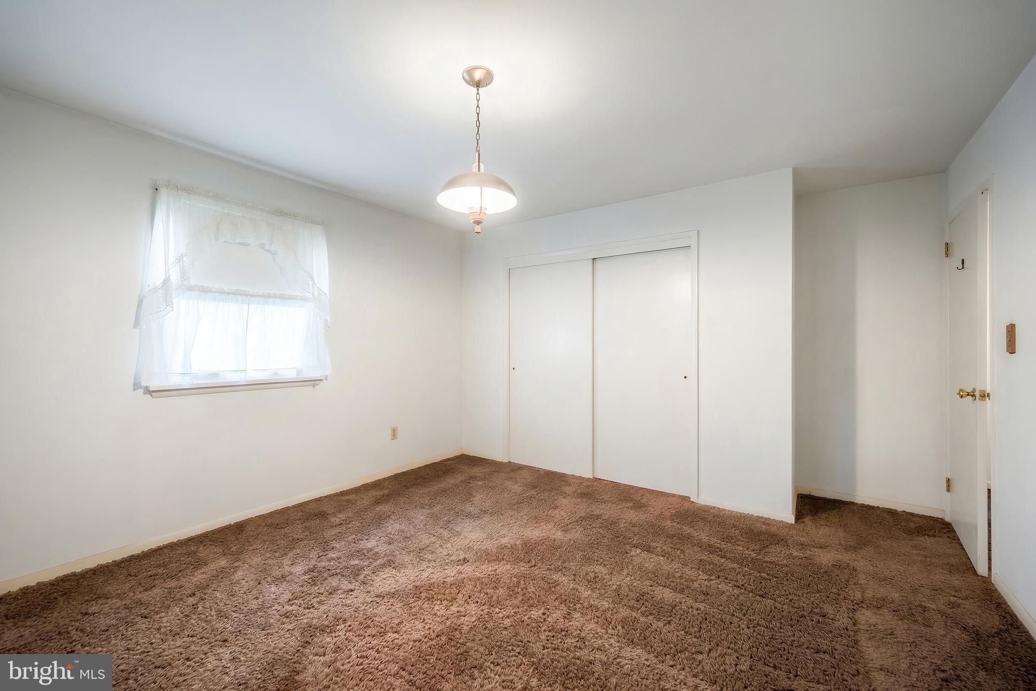 145 Mt Tabor Road Aspers, PA 17304 - Photo 14 of 40 a view of an empty room with a window