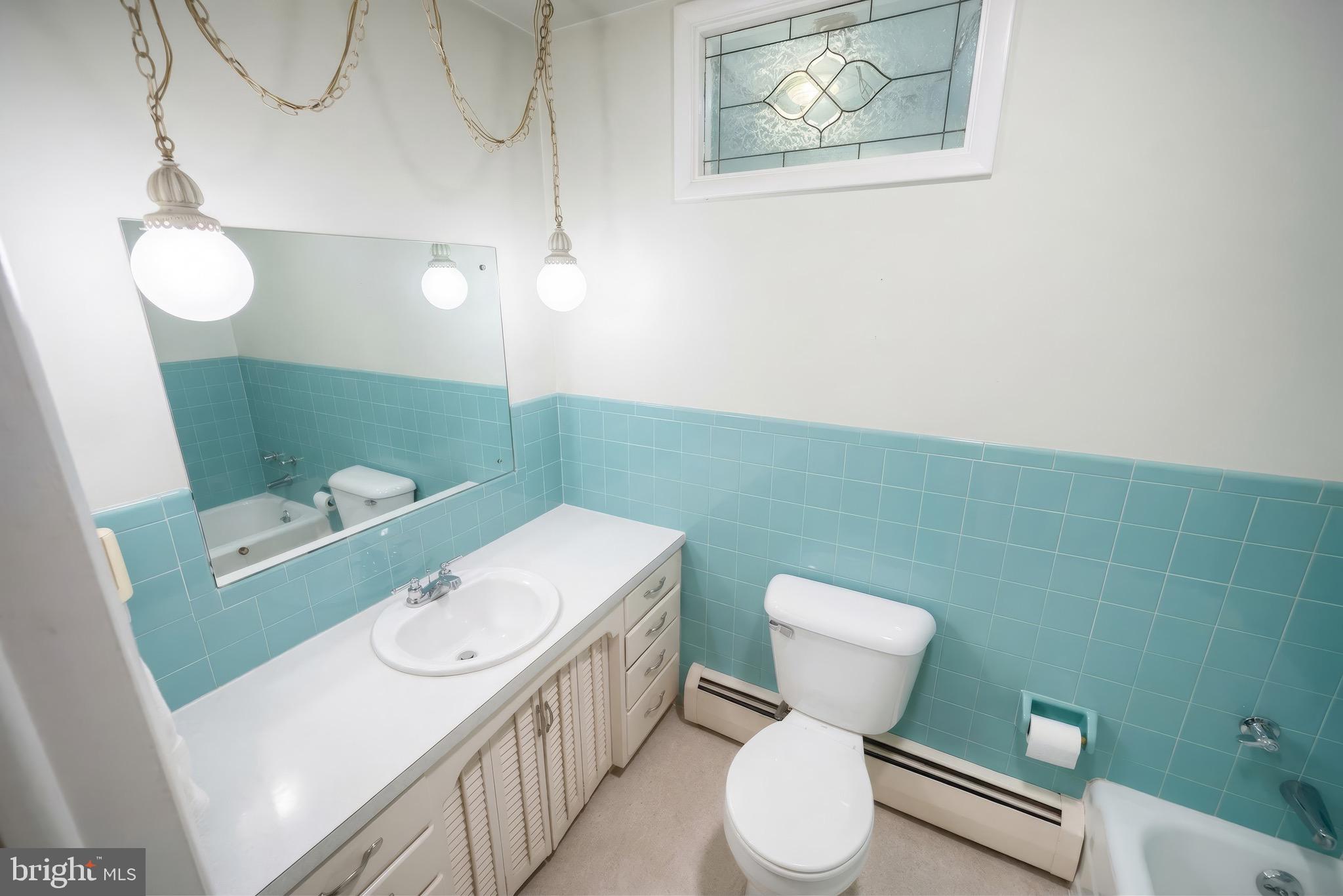 145 Mt Tabor Road Aspers, PA 17304 - Photo 17 of 40 a bathroom with a toilet sink and mirror
