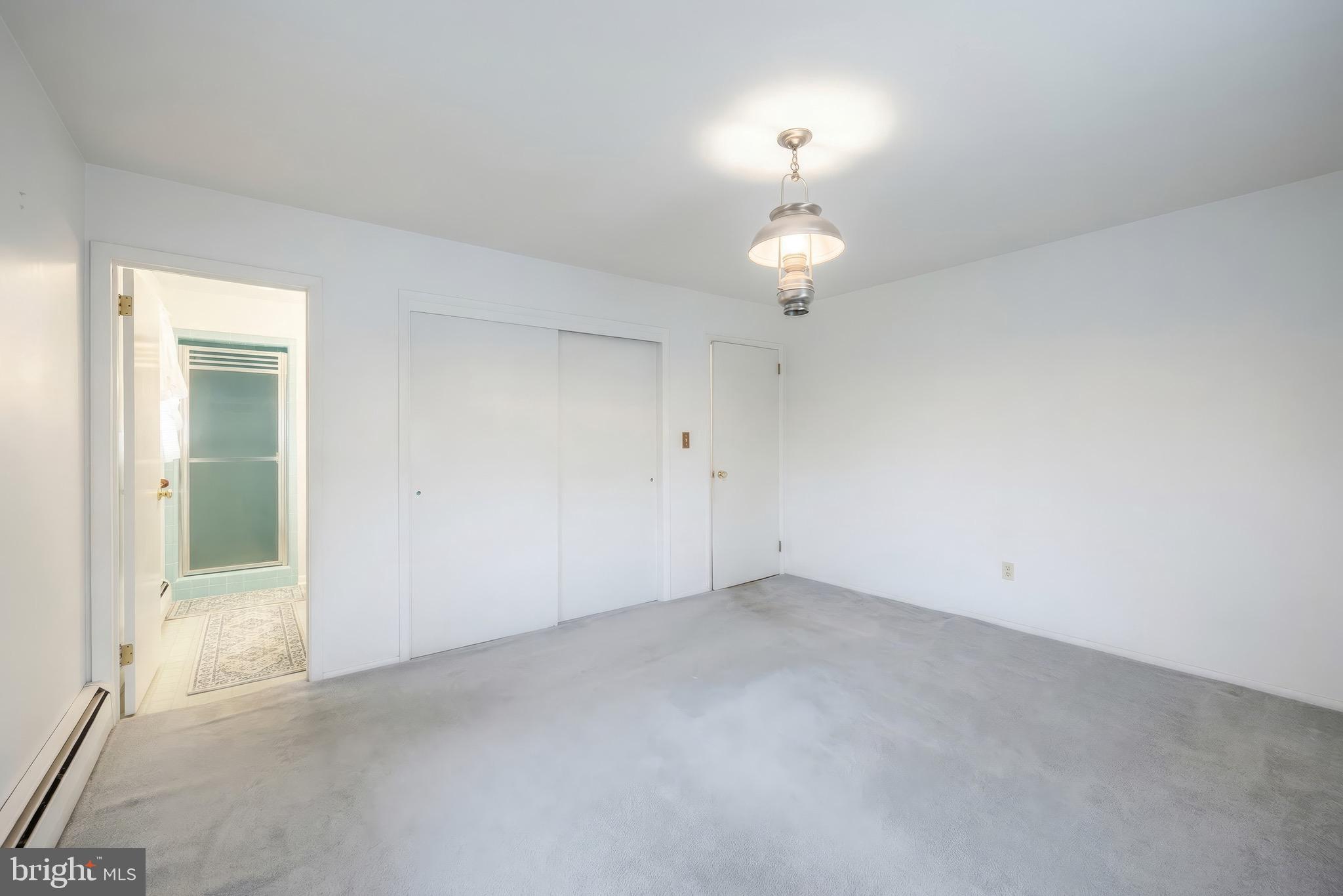145 Mt Tabor Road Aspers, PA 17304 - Photo 20 of 40 an empty room with a chandelier fan and a window