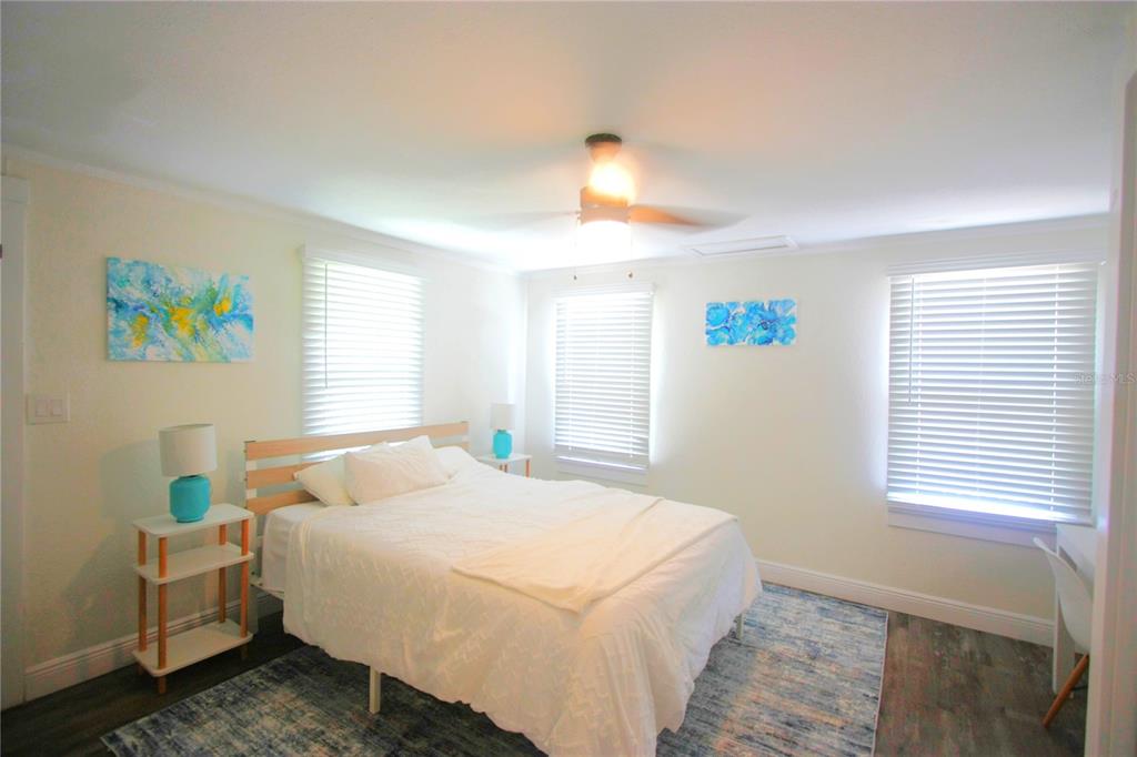 6602 North 9th Street Tampa, FL 33604 - Photo 14 of 22 a bedroom with a bed and a window