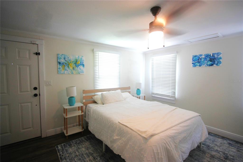 6602 North 9th Street Tampa, FL 33604 - Photo 16 of 22 a bedroom with a bed and a window