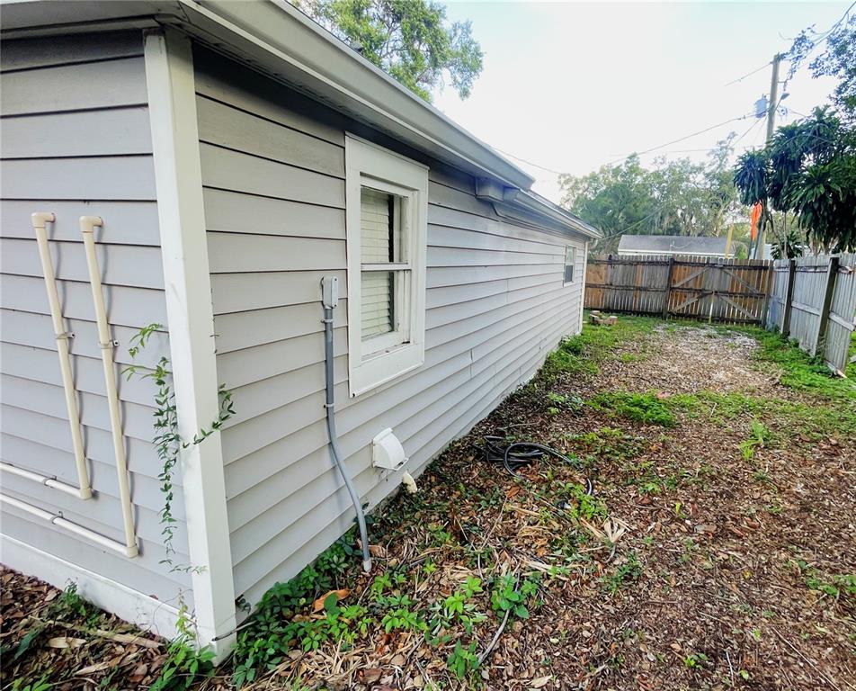 6602 North 9th Street Tampa, FL 33604 - Photo 19 of 22 a view of a back yard of the house