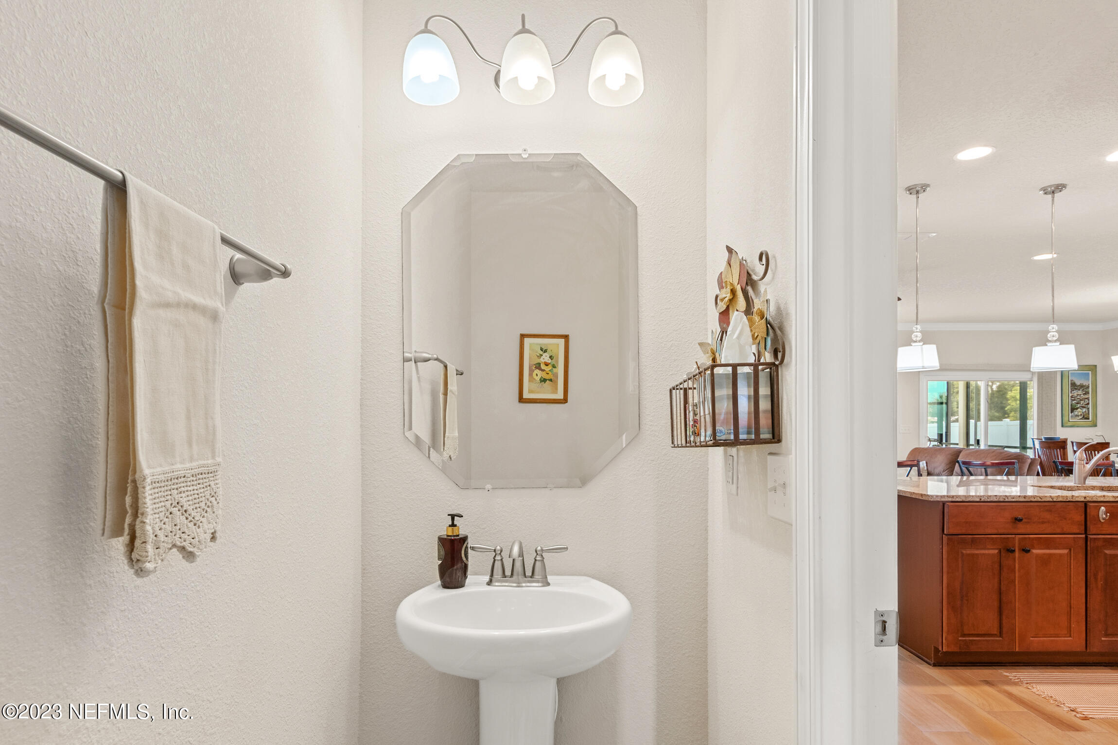 57 Deer Crossing Road St. Augustine, FL 32086 - Photo 7 of 48 a bathroom with a sink and a mirror