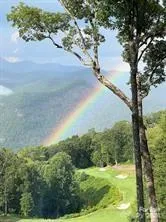 a view of an outdoor space with a lake view
