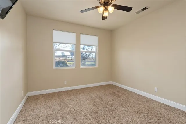 a living room with furniture rug and window