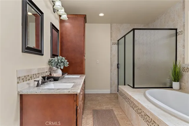 a view of a balcony with an outdoor seating