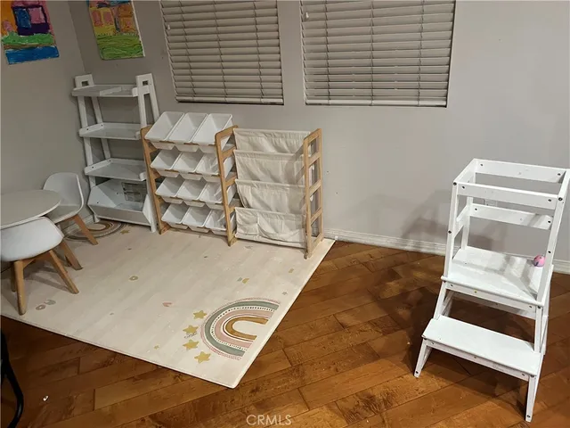 a room with table and chairs