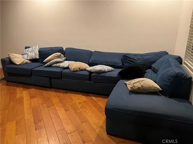 a living room with furniture and a couch