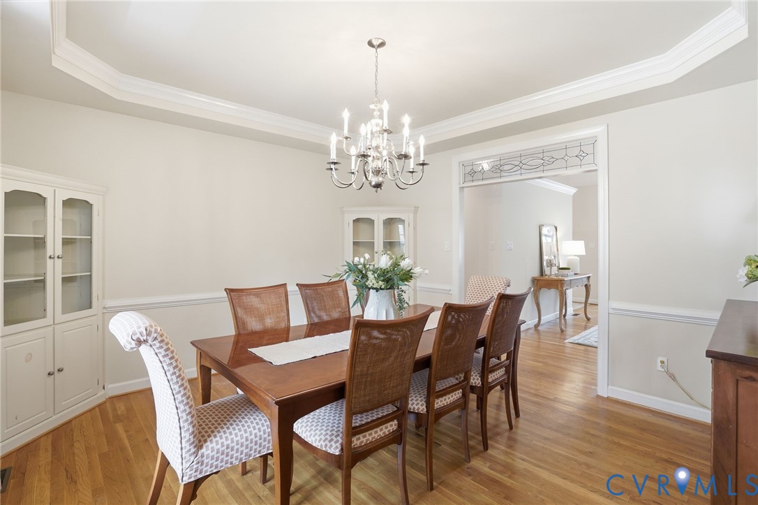 14430 Overlook Ridge Lane Beaverdam, VA 23015 - Photo 18 of 71 a view of a dining room with furniture and chandelier