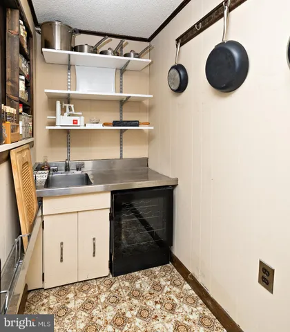 a bedroom with a bed and a fireplace