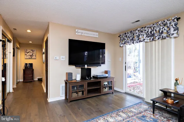 a utility room with sink dryer and washer