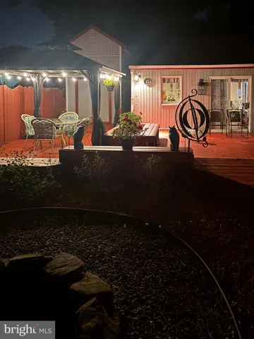 a view of backyard with deck